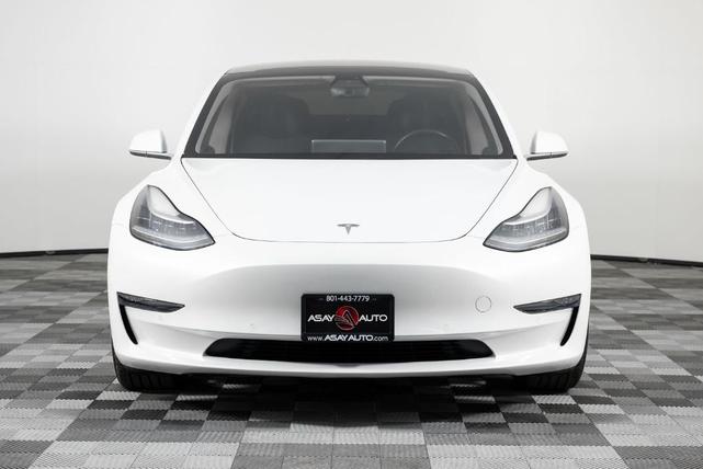 Photo of 2018 Pearl White Multi Tesla Model 3