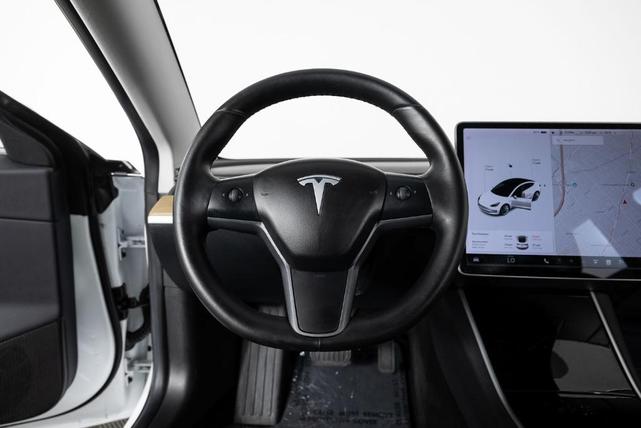 Photo of 2018 Pearl White Multi Tesla Model 3