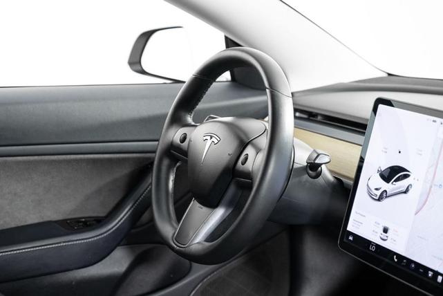 Photo of 2018 Pearl White Multi Tesla Model 3
