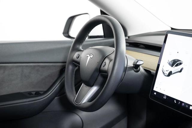 Photo of 2021 Pearl White Multi Tesla Model Y