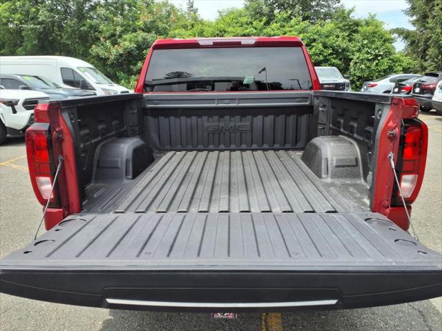 Photo of 2024 Volcanic Red Tintcoat GMC Sierra 1500