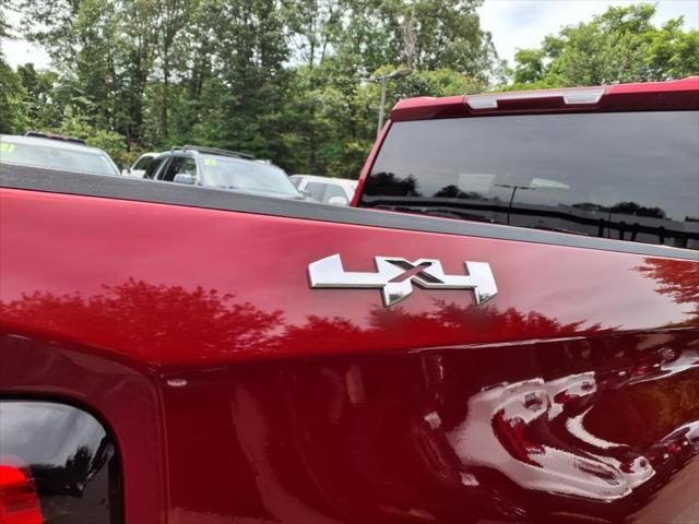 Photo of 2024 Volcanic Red Tintcoat GMC Sierra 1500