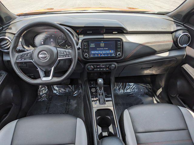 Photo of 2024 Monarch Orange Metallic/Super Black Nissan Kicks
