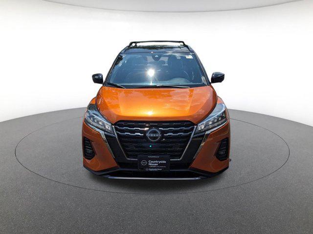 Photo of 2024 Monarch Orange Metallic/Super Black Nissan Kicks