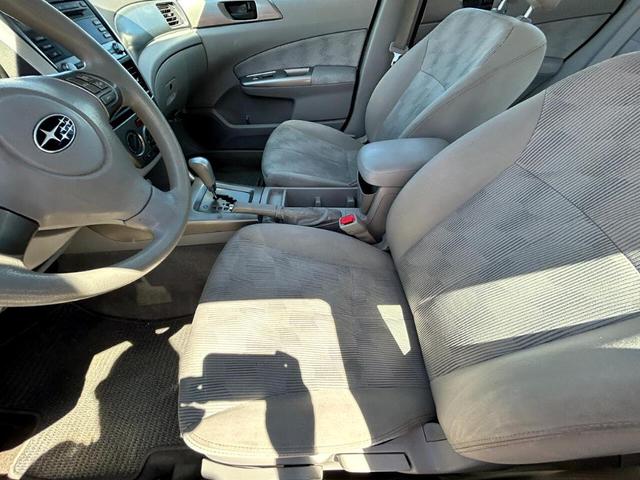 Photo of 2010 Camellia Red Pearl Subaru Forester
