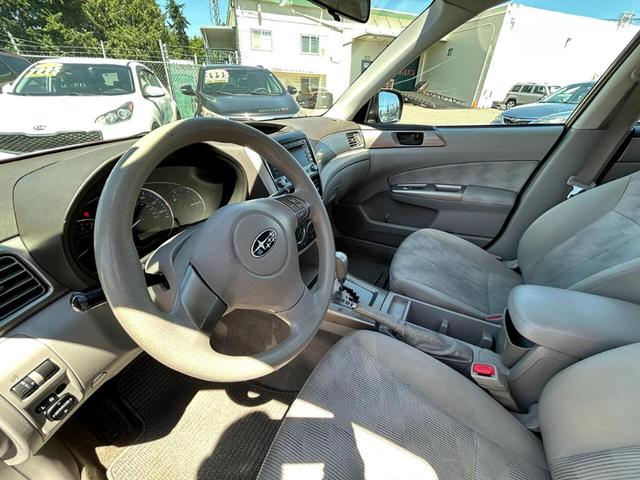 Photo of 2010 Camellia Red Pearl Subaru Forester