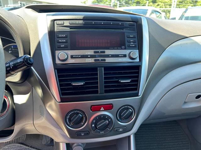 Photo of 2010 Camellia Red Pearl Subaru Forester