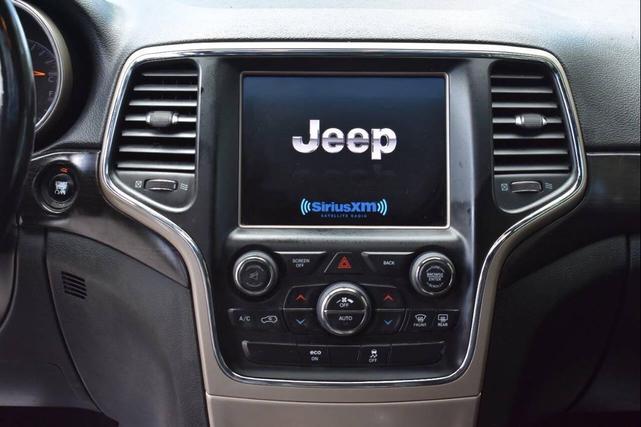 Photo of 2014 Bright White Clearcoat Jeep Grand Cherokee