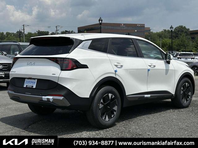 Photo of 2026 White Pearl Kia Sportage Hybrid