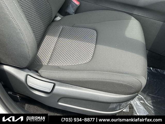 Photo of 2026 White Pearl Kia Sportage Hybrid