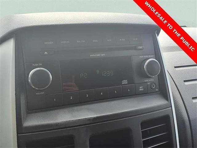 Photo of 2010 Inferno Red Crystal PC/Mineral Gray Met CC Dodge Grand Caravan