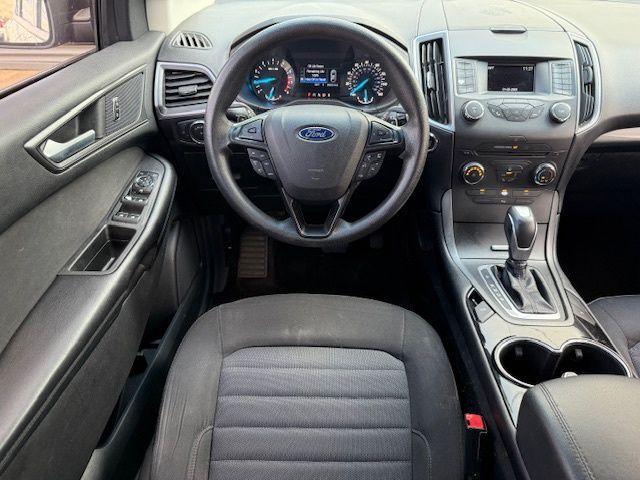 Photo of 2016 Kona Blue Metallic Ford Edge