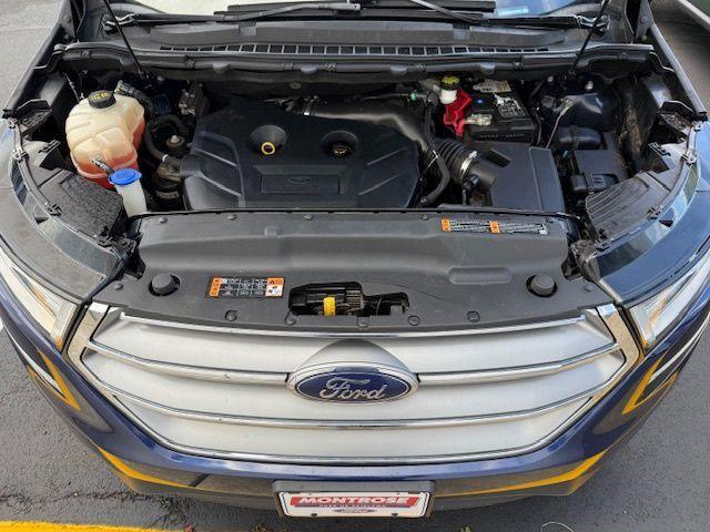 Photo of 2016 Kona Blue Metallic Ford Edge