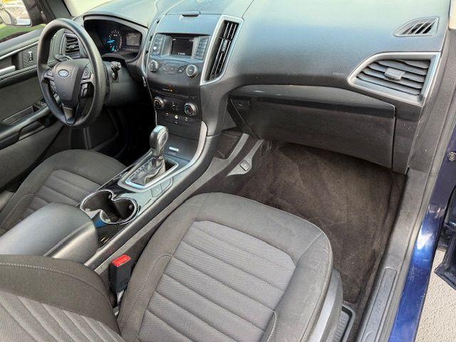 Photo of 2016 Kona Blue Metallic Ford Edge