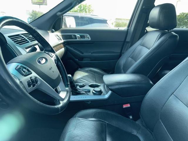 Photo of 2013 Ruby Red Metallic Ford Explorer