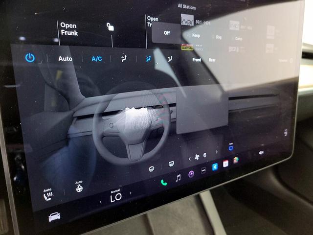 Photo of 2021 Red Tesla Model 3
