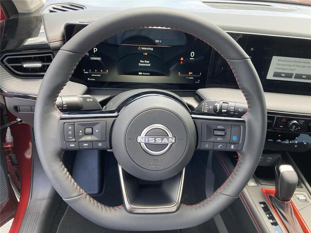 Photo of 2025 Scarlet Ember Tintcoat Nissan Kicks