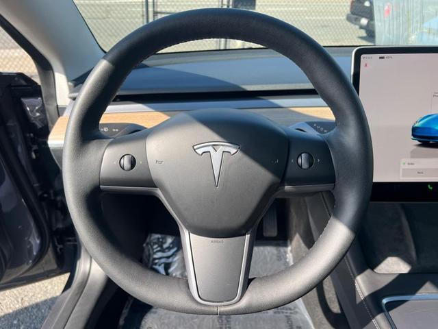 Photo of 2023 Midnight Silver Metallic Tesla Model 3