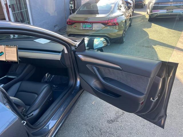 Photo of 2023 Midnight Silver Metallic Tesla Model 3