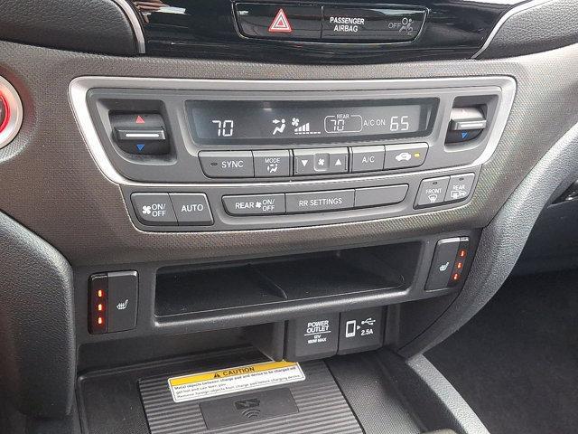Photo of 2022 Platinum White Honda Passport