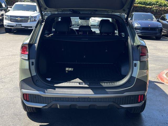 Photo of 2023 Jungle Green Kia Sportage