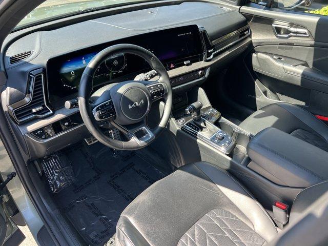 Photo of 2023 Jungle Green Kia Sportage