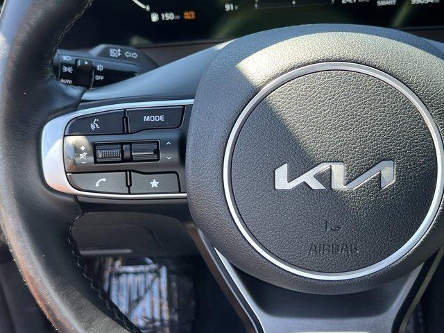 Photo of 2023 Jungle Green Kia Sportage