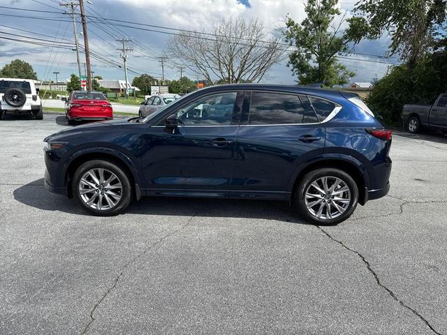 Photo of 2024 Deep Crystal Blue Mica Mazda CX-5