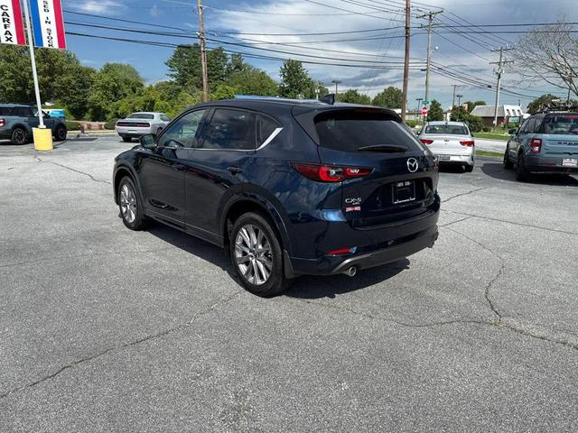 Photo of 2024 Deep Crystal Blue Mica Mazda CX-5