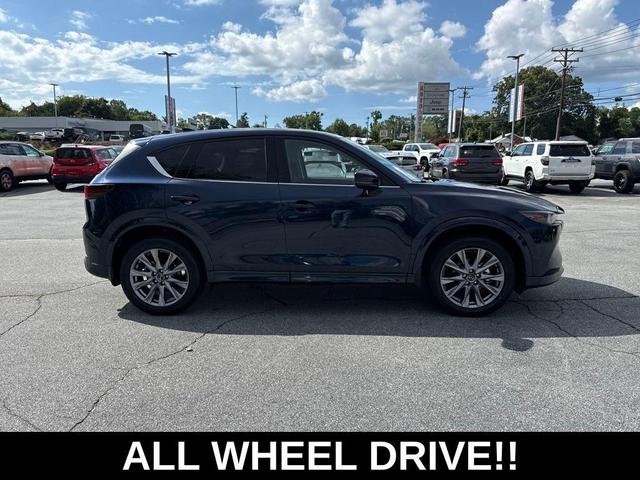 Photo of 2024 Deep Crystal Blue Mica Mazda CX-5