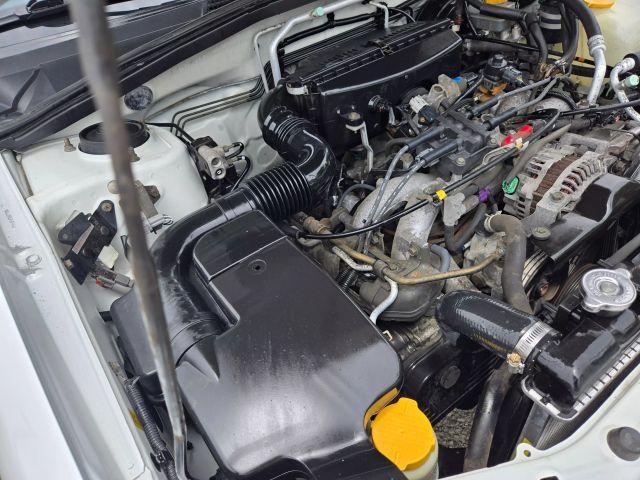 Photo of 2004 Aspen White / Textured Gray Subaru Forester
