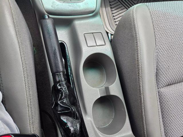 Photo of 2004 Aspen White / Textured Gray Subaru Forester