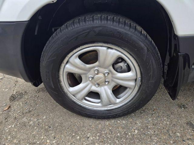Photo of 2004 Aspen White / Textured Gray Subaru Forester