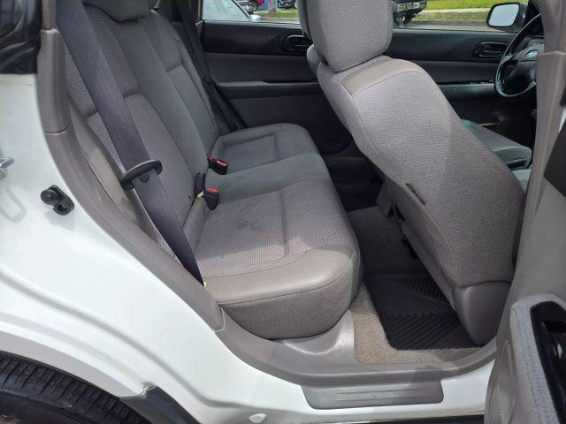 Photo of 2004 Aspen White / Textured Gray Subaru Forester