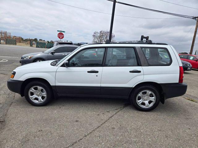 Photo of 2004 Aspen White / Textured Gray Subaru Forester