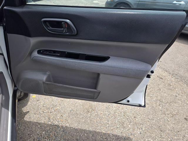Photo of 2004 Aspen White / Textured Gray Subaru Forester