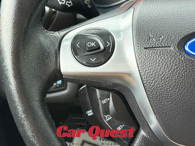 Photo of 2016 Ruby Red Metallic Tinted Clearcoat Ford Escape