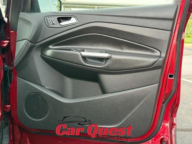 Photo of 2016 Ruby Red Metallic Tinted Clearcoat Ford Escape