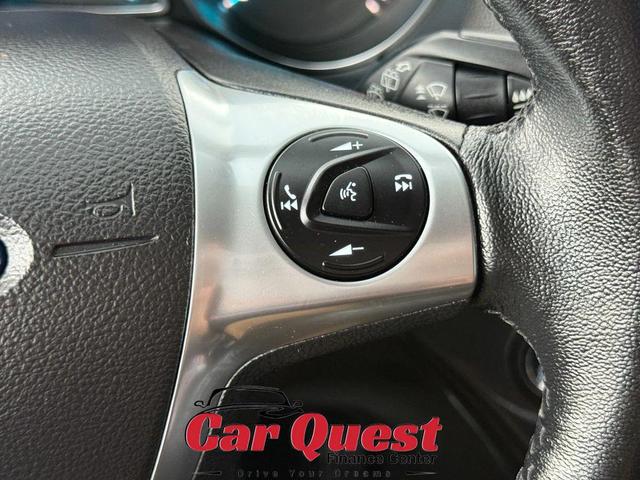 Photo of 2016 Ruby Red Metallic Tinted Clearcoat Ford Escape