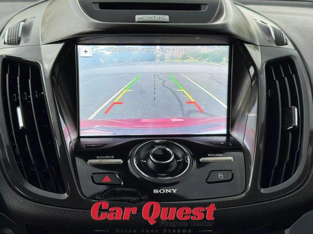 Photo of 2016 Ruby Red Metallic Tinted Clearcoat Ford Escape