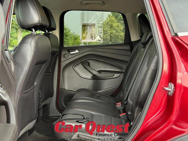 Photo of 2016 Ruby Red Metallic Tinted Clearcoat Ford Escape