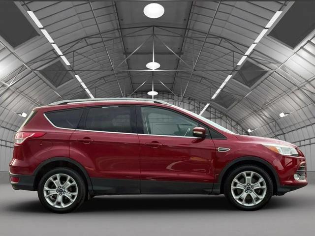 Photo of 2016 Ruby Red Metallic Tinted Clearcoat Ford Escape