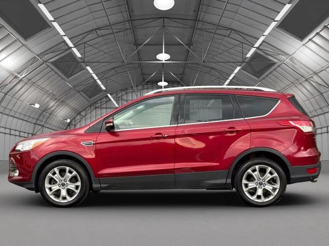 Photo of 2016 Ruby Red Metallic Tinted Clearcoat Ford Escape