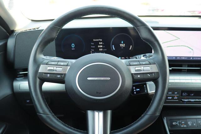 Photo of 2024 Atlas White Hyundai KONA EV