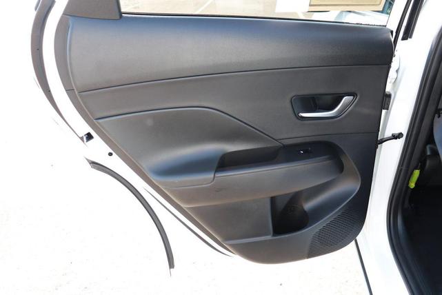 Photo of 2024 Atlas White Hyundai KONA EV