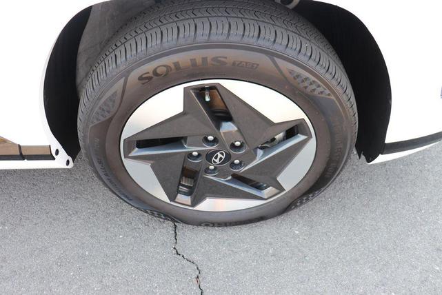 Photo of 2024 Atlas White Hyundai KONA EV