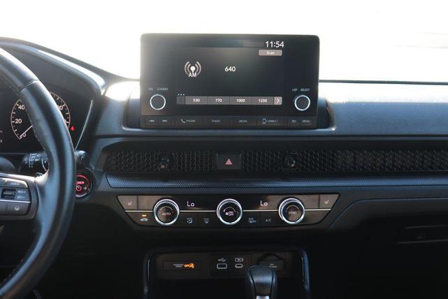 Photo of 2024 Radiant Red Metallic Honda CR-V Hybrid