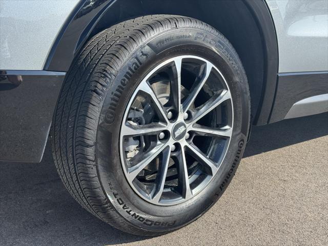 Photo of 2024 Argent Silver Metallic Cadillac XT4