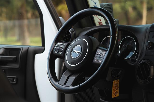 Photo of 2018 Bright White Clearcoat Jeep Wrangler JK Unlimited