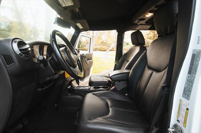 Photo of 2018 Bright White Clearcoat Jeep Wrangler JK Unlimited